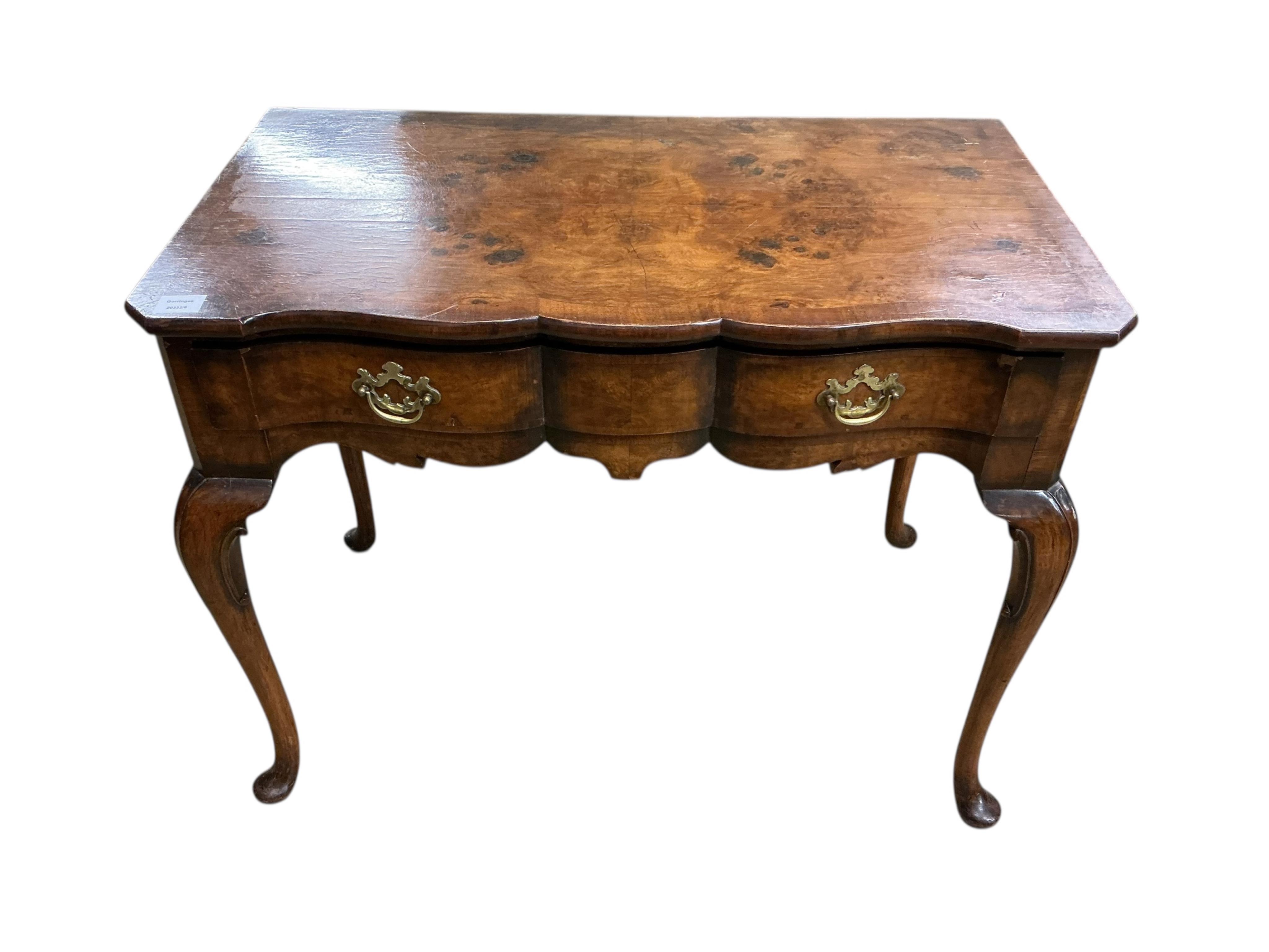 A Queen Anne Revival banded walnut side table, width 90cm, depth 51cm, height 72cm together with a similar stool